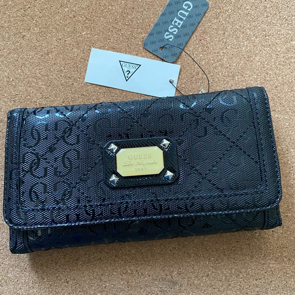 Black Guess with tan interior card holder